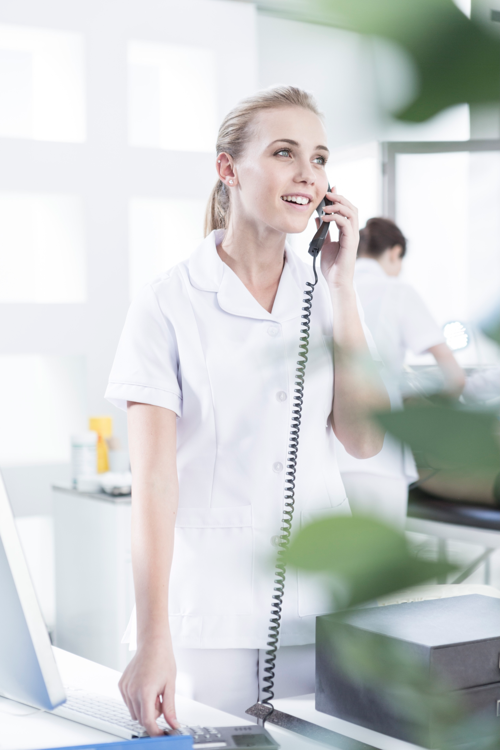 nurse in hospital on the phone
